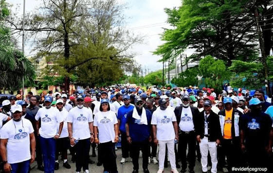 Wide view of the procession filling the street